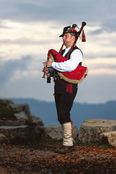 istock Bergamo Bagpipe. Player with traditional costume 1057990322