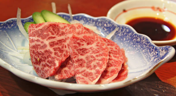 istock Hida beef sashimi served with dipping soya sauce 1057996406