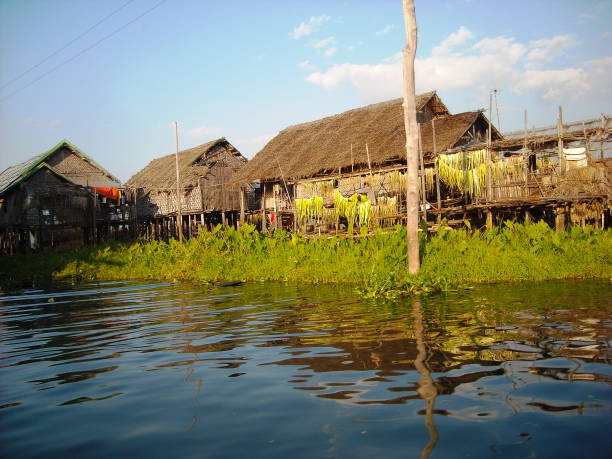 istock a fishers house at the river in burma 1058000406