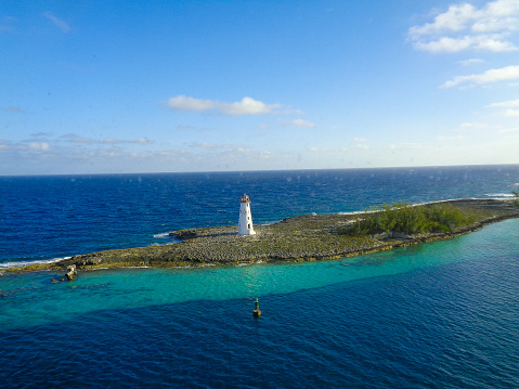 nice view to an island with lighthouse on it