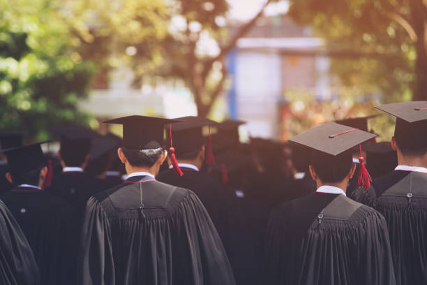 istock Group of Graduates during commencement. Concept education congratulation in University. Graduation Ceremony ,Congratulated the graduates in University during commencement. 1058002268
