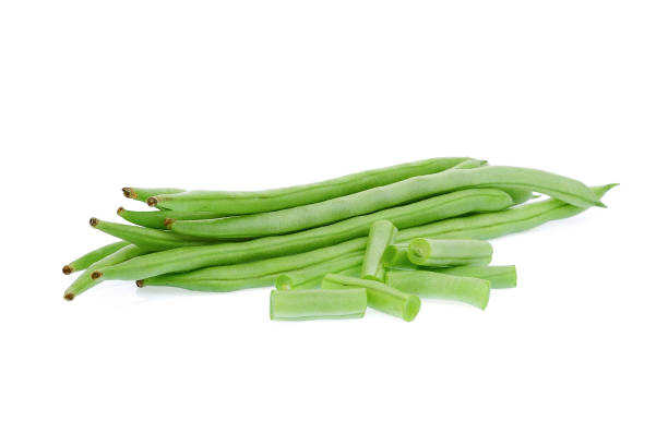 istock green beans with slices isolated on white background 1058007992