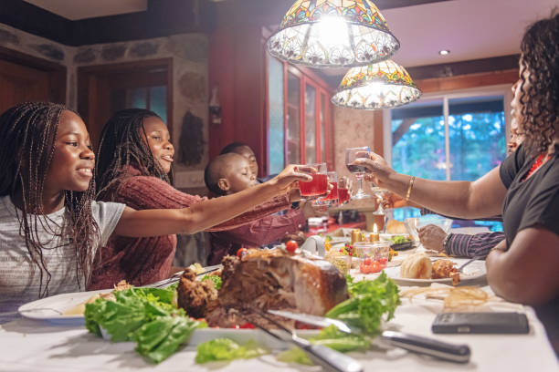istock African-American during thanksgiving dinner 1058013672