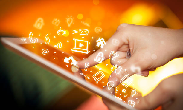 istock Finger pointing on tablet pc, social media concept 1058013994