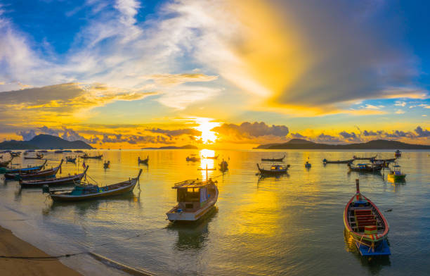 istock aerial view panorama sunrise above Rawai gulf 1058014158