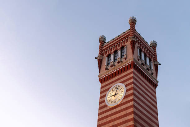 European style clock tower after restoration. Russian clocktower in downtown of Yoshkar-ola city, Russia. Copy space.