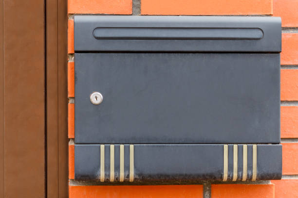 istock A beautiful mailbox hangs waiting for newspapers, parcels and letters. 1058020062