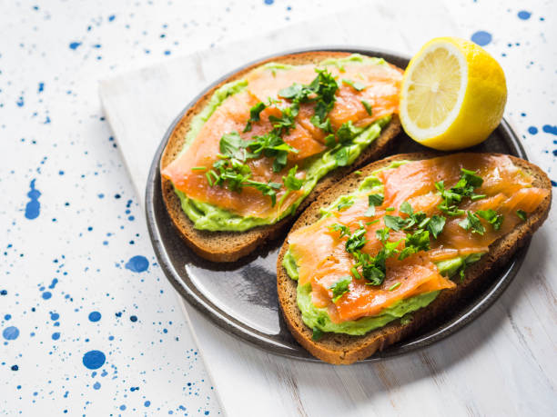 istock Rye bread avocado toasts with smoked salmon 1058027536