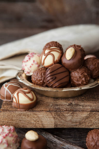 istock Little plate with truffles and chocolates 1058029630