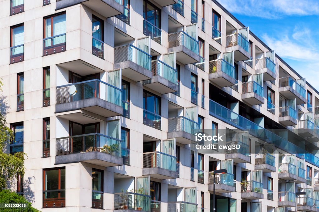 Rows of balconies in modern apartment building Rows of balconies in modern apartment building, Warsaw, Poland Apartment Stock Photo