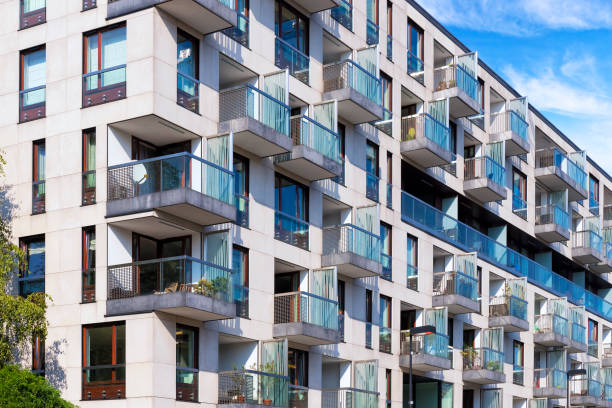 Rows of balconies in modern apartment building, Warsaw, Poland