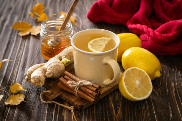 istock Autumn hot drink - ginger, lemon, honey tea and ingredients 1058034884