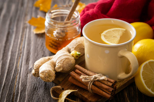istock Autumn hot drink - ginger, lemon, honey tea and ingredients 1058034922