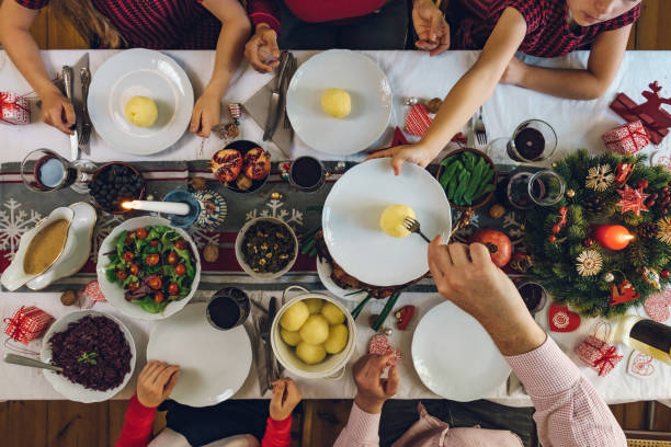 istock family dining at christmas table 1058034990