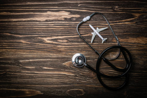 Medical tourism concept - stethoscope, airplane