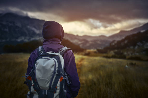 istock Traveling alone in the mountains at sunset 1058035712