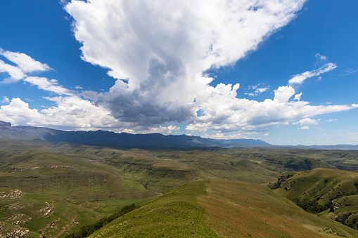 Clouds over green mountain area Drakensberg South Africa