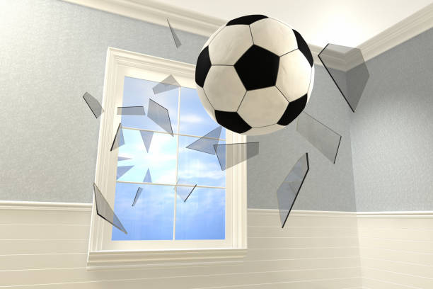 Ball Window 90+ Broken Window Ball House Stock Photos, Pictures & Royalty-Free ...
