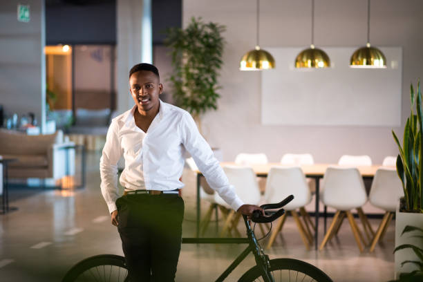 istock Successful millennial entrepreneur stands proudly in his office 1058043780