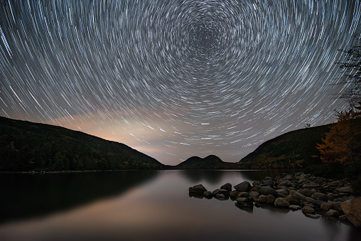 Star trail over Jordan pond in Acadia National Park Maine