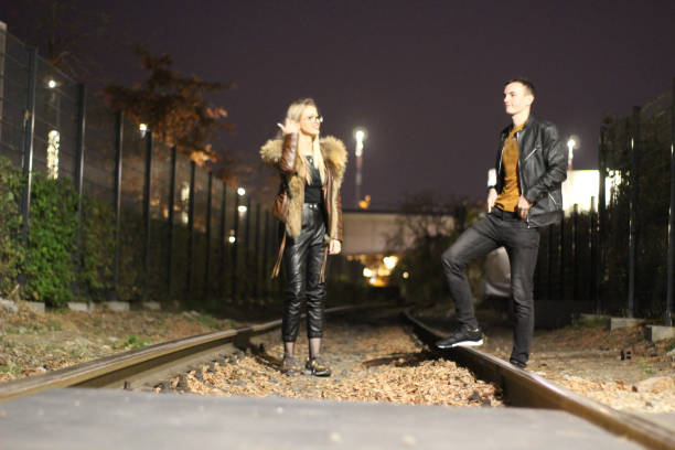 istock Two young people in love on the rails 1058044776