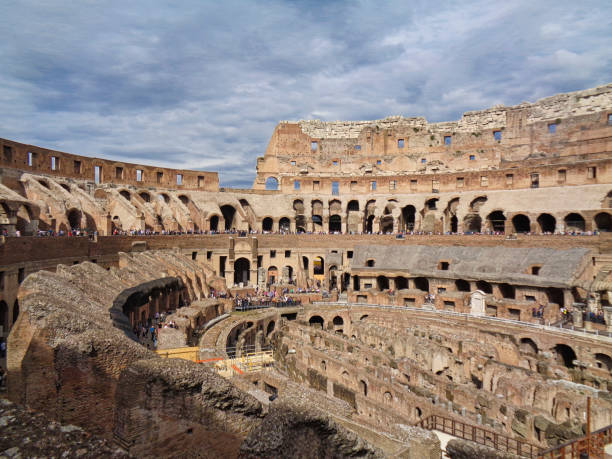 istock the colloseum in rome with cloudy sky 1058044940