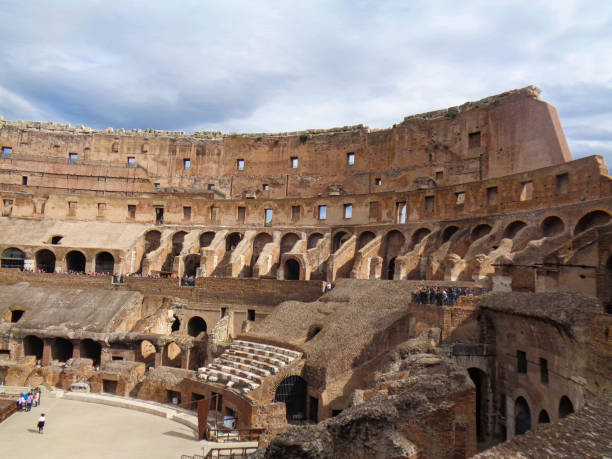 istock the colloseum in rome with cloudy sky 1058044946