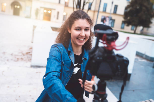istock Girl is vlogging in the city 1058045698