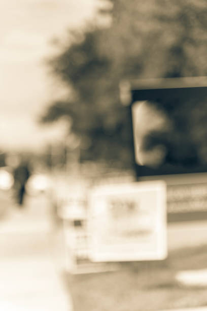 istock Blurry background yard sign at for election campaign votes in Dallas 1058047690
