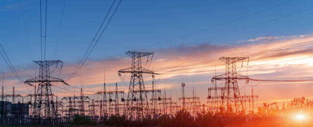 istock distribution electric substation with power lines and transformers. 1058060536