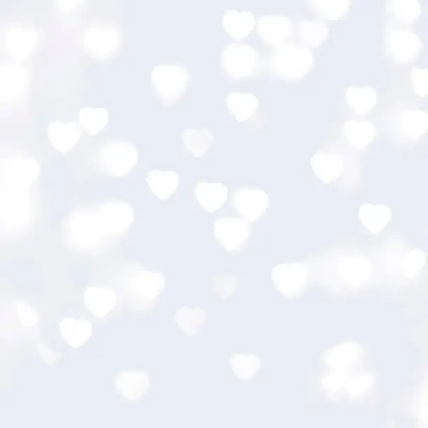 Photo of Blurred Unfocussed White Lights in the Shape of Heart White Background