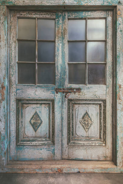 Ancient weathered double entrance door