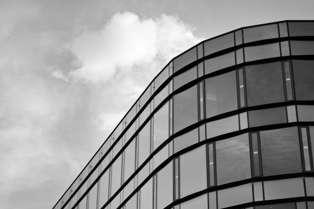 istock Modern building. Modern office building with facade of glass. Black and white. 1058063876