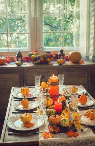 istock Thanksgiving Dining Table Place Setting with Autumn Decoration 1058065488