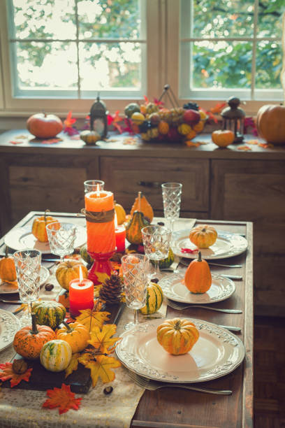 istock Thanksgiving Dining Table Place Setting with Autumn Decoration 1058065494
