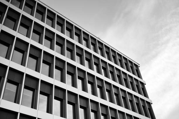 istock Modern building. Modern office building with facade of glass. Black and white. 1058065520