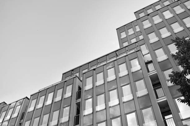 istock Modern building. Modern office building with facade of glass. Black and white. 1058065546