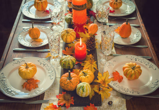 istock Thanksgiving Dining Table Place Setting with Autumn Decoration 1058065702