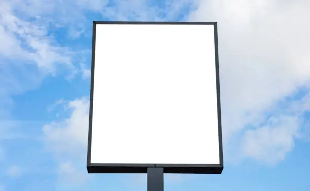 Photo of Blank billboard mockup for advertising, blue sky background
