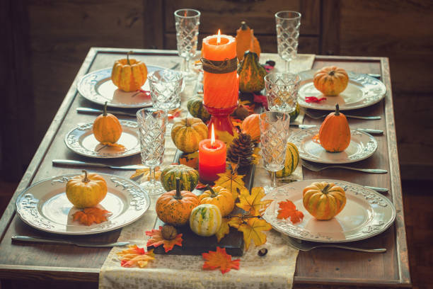 istock Thanksgiving Dining Table Place Setting with Autumn Decoration 1058066164