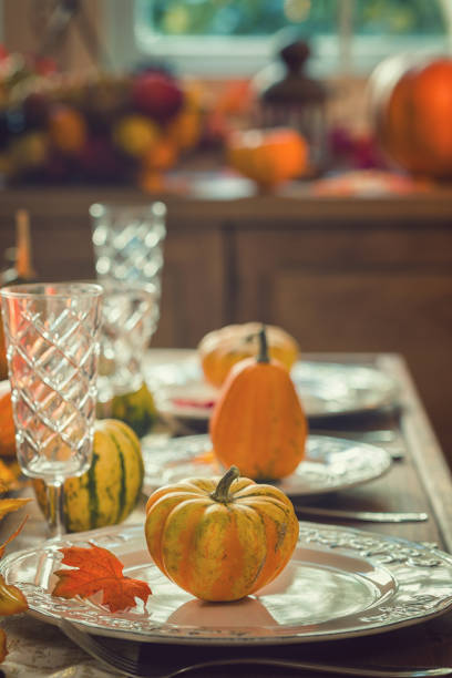 istock Thanksgiving Dining Table Place Setting with Autumn Decoration 1058066406
