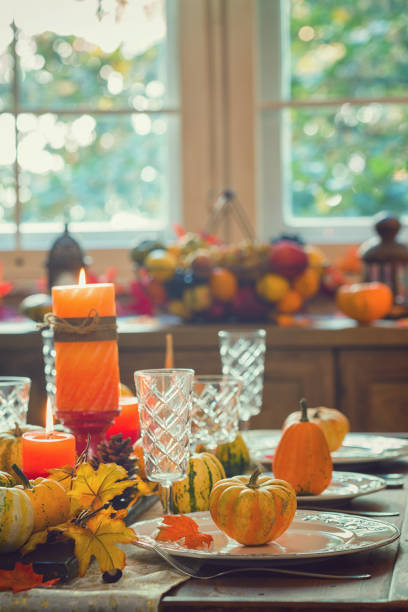 istock Thanksgiving Dining Table Place Setting with Autumn Decoration 1058066414