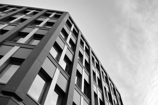 istock Modern building. Modern office building with facade of glass. Black and white. 1058067256