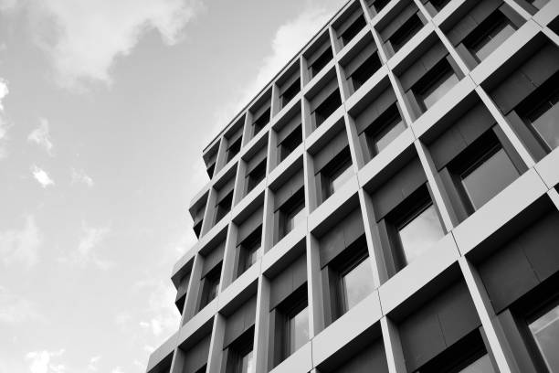 istock Modern building. Modern office building with facade of glass. Black and white. 1058068992