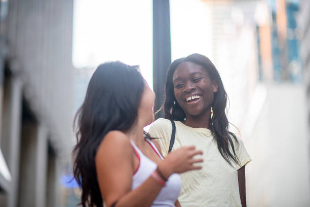 istock Two beautiful girls spending time with each other 1058069640