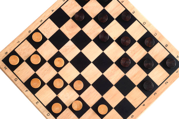 istock wooden checkerboard with checkers spaced isolated on white 1058069714