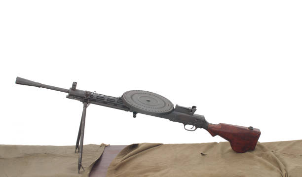 istock Soviet machine gun Degtyarev on the table isolated on a white background. Horizontal. 1058073800