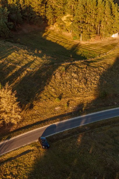 istock Countryside with road from above 1058075496