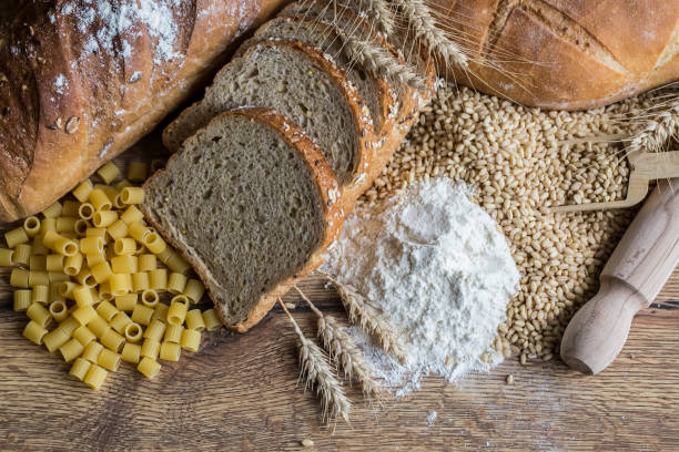 istock Fresh fragrant bread on the table. Food concept 1058076370