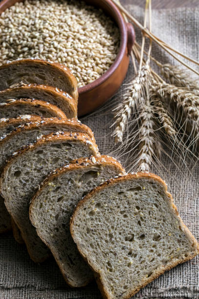 istock Fresh fragrant bread on the table. Food concept 1058076672